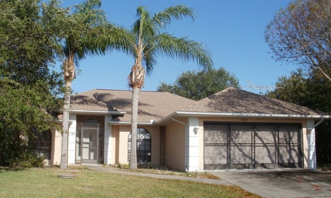 Gulf Cove House | Soothing 3-bedroom house with AC in Port Charlotte. On the river near beach
