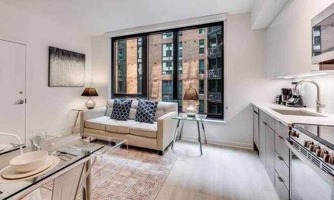 NoMa Hotel | Sophisticated 1BR Deluxe with Rooftop Views, Gym, & Relaxing Pool in NoMa