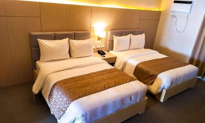 Pasong Tamo Apartment | Sotogrande Neopolitan Hotel