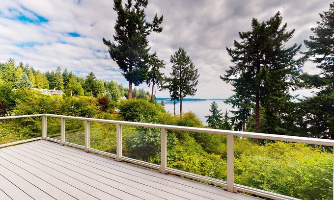Anderson Island House | Sound view home full of vintage charm with game room, wood stove, & gas grill