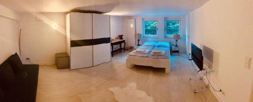 Kalkum House | Souterrain Zimmer mit separatem Eingang und Bad