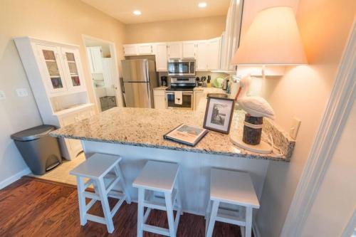 Beachwalk House | Southern Sunshine! Beach views and steps to the sand, short golf cart ride to the pool.