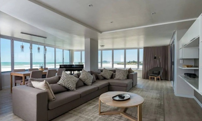 Lagoon Beach Apartment | Spacious 2 Bedroom, Panoramic Sea Views with Wifi and Parking