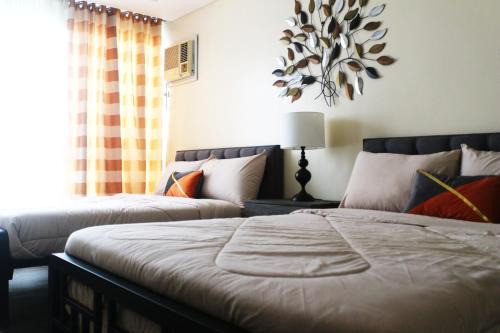 Barangay 76 Apartment | Spacious 3 Bedrooms with wifi access and pool near SM MOA Arena