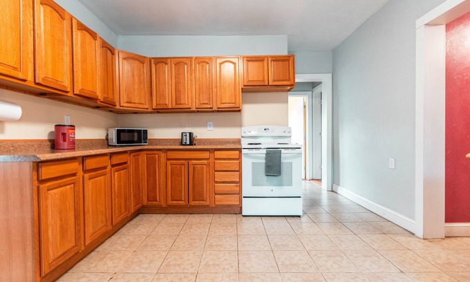 Worcester Apartment | Spacious 4-bedroom apartment close to UMass Medical and St. Vincent Hospital