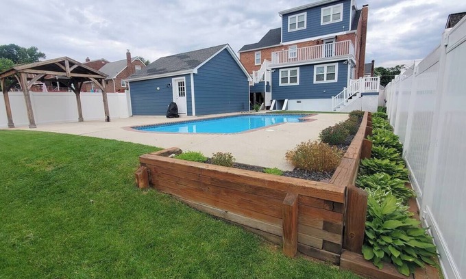 Parkville House | Spacious 4-bedroom townhome with great backyard and POOL in charming Parkville