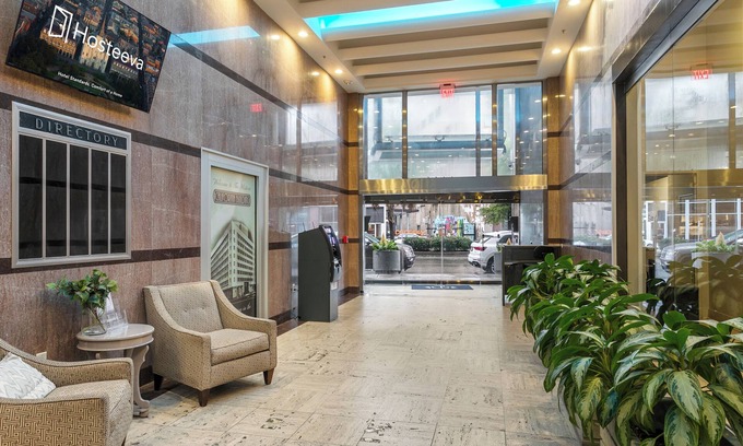 Central Business District Apartment | Spacious 4BD Condo-Sleeps 12-Walk to Bourbon St & Superdome