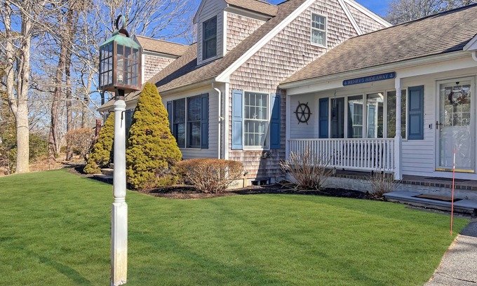 Centerville House | Spacious Cape style home with partial lake views 3 bedroom, 2 bathroom Beach Pass Included