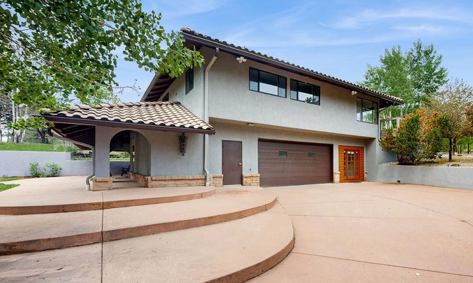 Colorado Springs House | Spacious home with indoor heated pool, volley ball court, and is dog-friendly