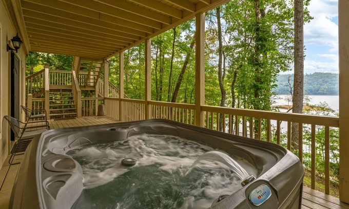 Sharps Chapel Cabin | Spacious Lakefront home with private dock, hot tub, grill & pool table