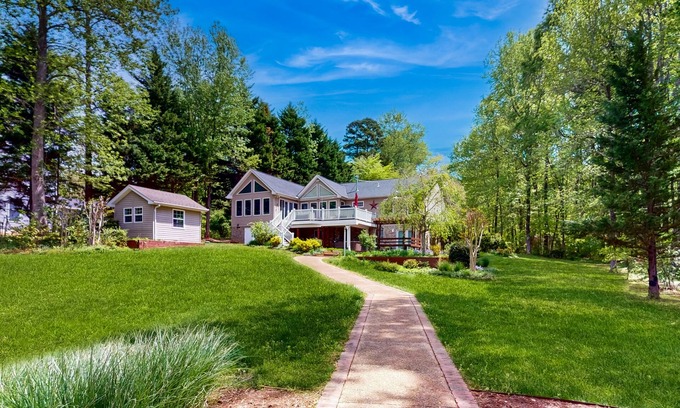 Lakeside Woods House | Spacious lakefront house w/private hot tub, deck, fire pit & grill
