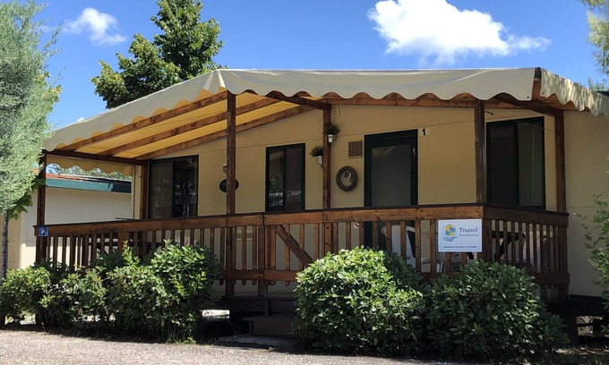 Viareggio Ski Chalet | Spacious mobile home, with veranda, on the family camping Paradiso