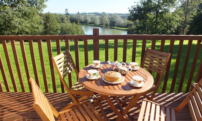Holsworthy House | Spacious two-bedroomed fully-accessible lodge with lake view in rural idyll