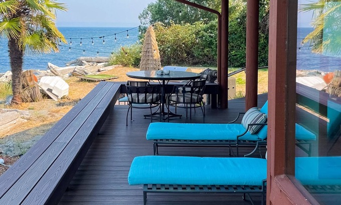 Kingston House | Spacious waterfront retreat with inviting deck, fireplace & games