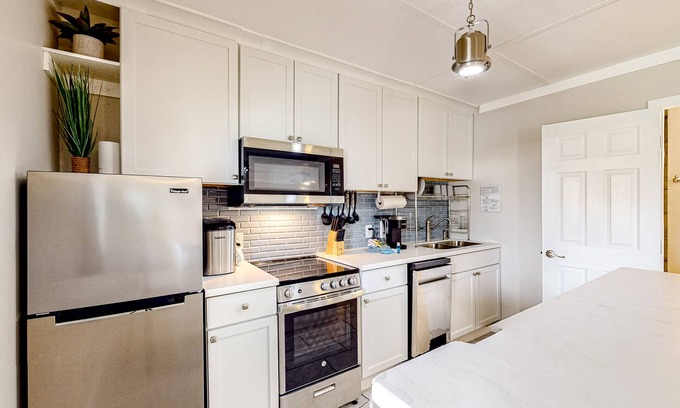 Perdido Key Coves One Apartment | Spacious waterfront studio with shared dock, tennis, & patio