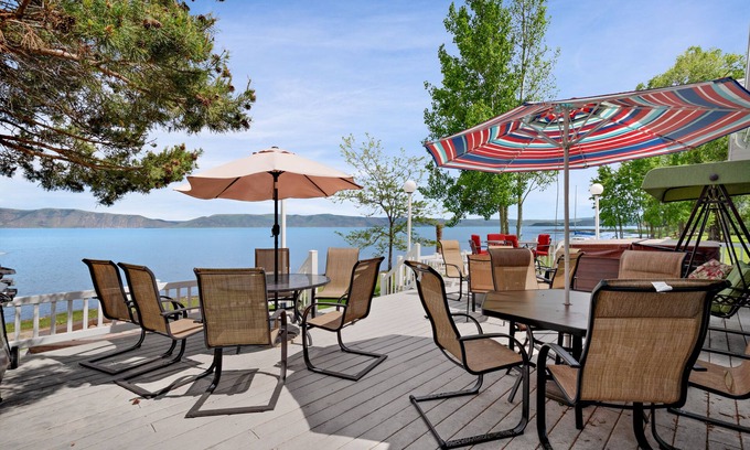 Garden City House | Spacious Waterfront Getaway with Private Hot Tub, Furnished Deck, and Game Room