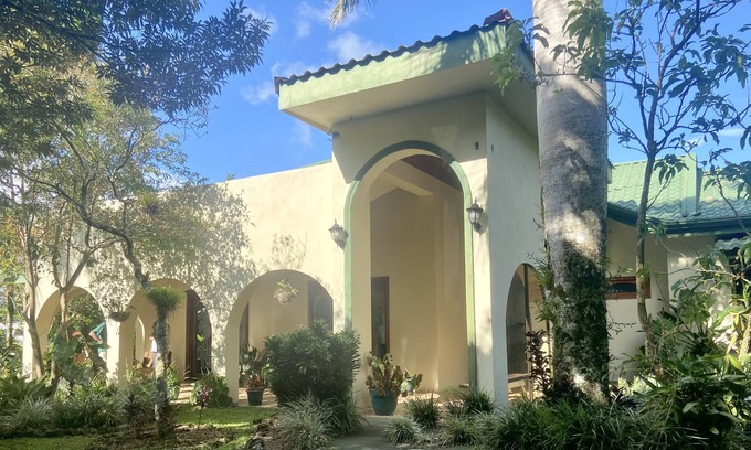 Tilaran House | Spanish Villa snuggled into a jungle / botanical garden paradise !