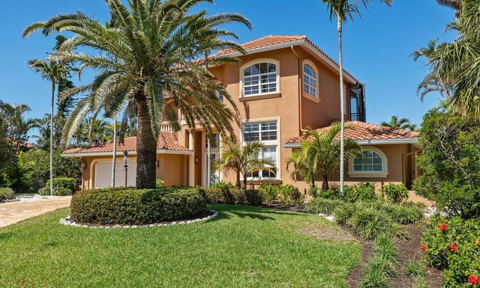 Shell Harbor House | Spectacular Direct access canal front beauty!