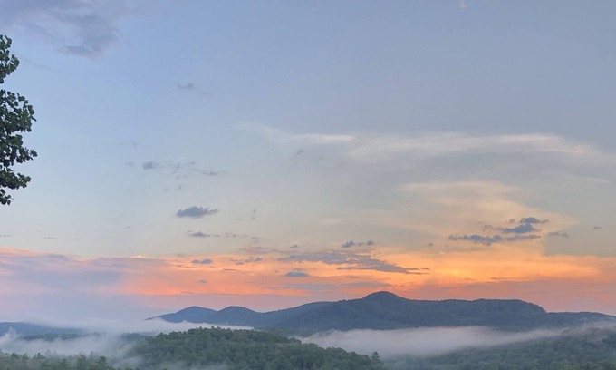 Sunset House | Spectacular view of a gorgeous mountain valley and golf course awaits you