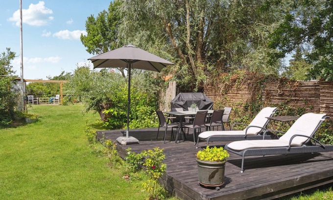 Vejlby Fed House | Spend a wonderful vacation in this comfortable cottage overlooking the sea from the property.