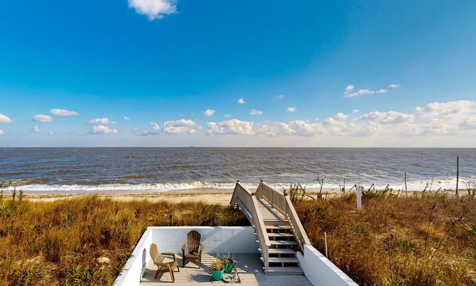 Prime Hook Beach House | Sprawling beachfront home with alfresco dining, grill, games, W/D, & open layout