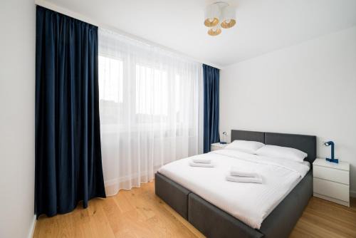 Bielany Apartment | Stawy Brustmana Homly Apartment by BookingHost