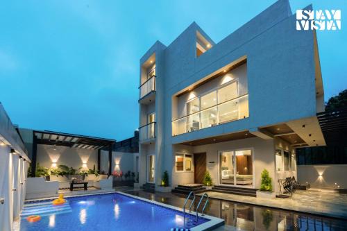 Khodala Villa | StayVista at Amara Palms