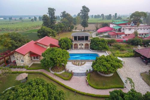 Dehradun Villa | StayVista at Dudly Manor with Swimming Pool