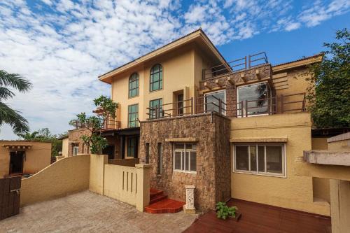 Kune Village Villa | StayVista's The Happy Hive - Cozy rooms and a pool for a delightful stay