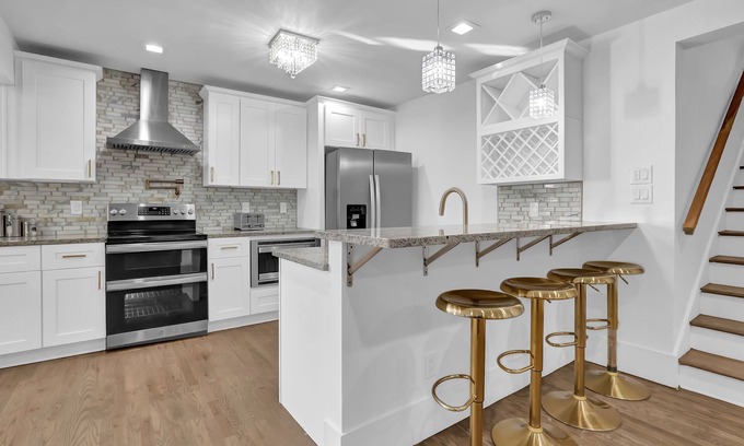 North Druid Hills House | Step into a world of spacious elegance as you enter this carefully curated home