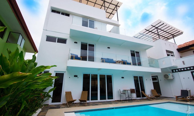 Playa Hermosa House | Steps from beach with private pool, rooftop terrace & swim up bar beach club!