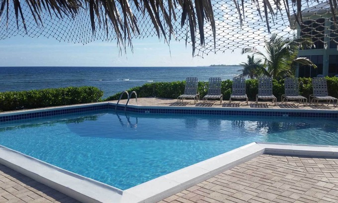 North Side Condo | Steps to Sand & Sea - Oceanfront Condo with Pool in Quiet Cayman Kai/Rum Point