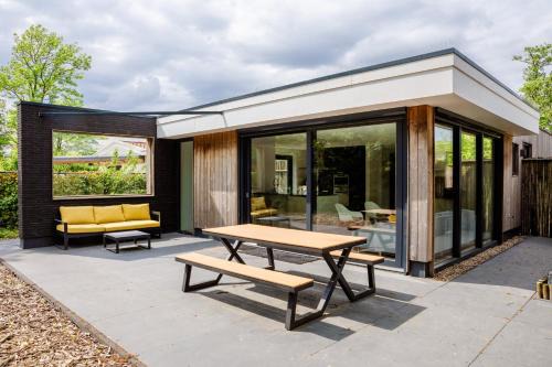Baarland House | Stijlvol ingerichte (4 pers.) bungalow in Baarland