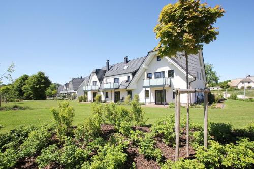 Lobbe Apartment | strandnahe FeWo mit Terrasse, gratis Nutzung vom AHOI Erlebnisbad und Sauna in Sellin - Rex Rugia FeWo 10-2