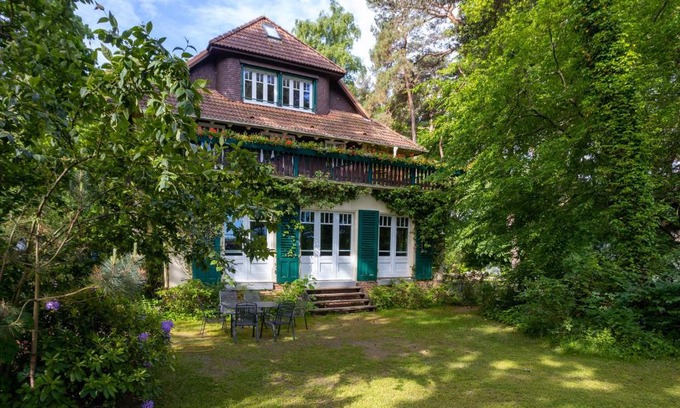 Boltenhagen Apartment | Strandvilla Hubertus Boltenhagen - Ferienwohnung Maisonette Apartment Kandinsky mit seitlichem Meerblick Parkplatz WLAN voll ausgestattete Küche Garten Grillplatz Waldbaden Familie Südlage