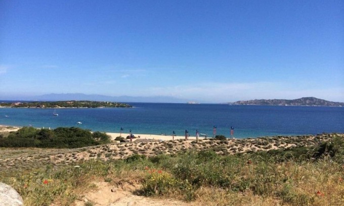 Porto Pollo Apartment | Studio apartment with sea view terrace and garden with barbecue