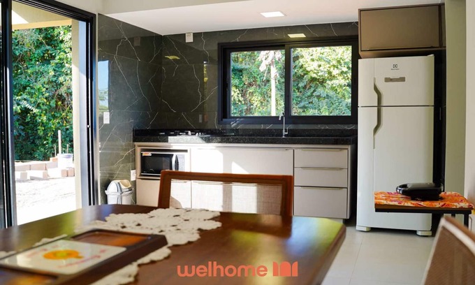 Delfinopolis Apartment | Studio em Delfinopolis com praia no condomínio