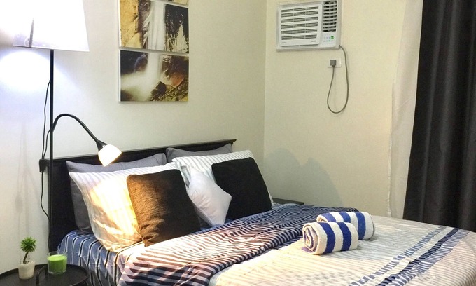 Phil-Am Apartment | STUDIO near MALLS and MRT STATION w/WiFi and NETFLIX
