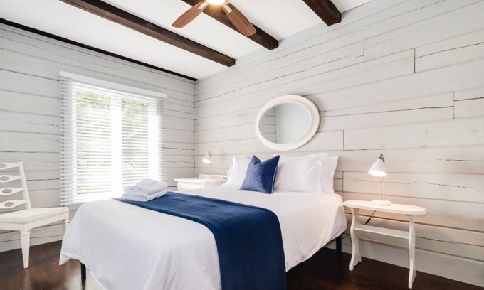 Pontiac House | Stunning waterfront getaway w/ hot tub, sleeps 10!