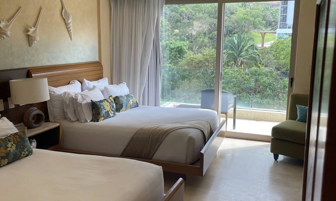 Independencia Apartment | Stunning 2 Bedroom 3 bath Garza Blanca Panoramic view of ocean. 7 day min.