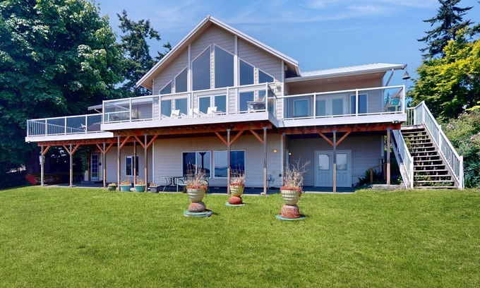 Greenbank House | Stunning 2 level waterfront home with firepit, WiFi, views, and pool table