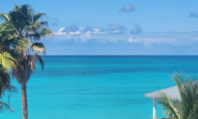 Alice Town Condo | Stunning Caribbean Ocean Views Centrally Located - Golf Cart Optional