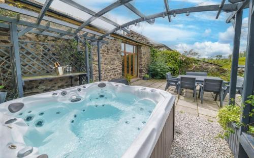 Bretherdale House | Stunning Character Barn with a hot tub