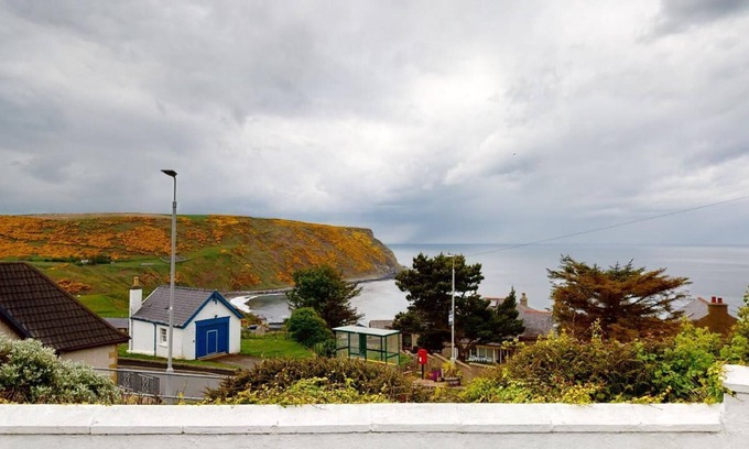 Gardenstown House | Stunning double storey home with sea views and sleeps 7