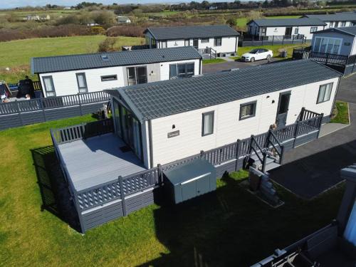 Truro Resort | Stunning Lodge with sea and country views, sleeps 6