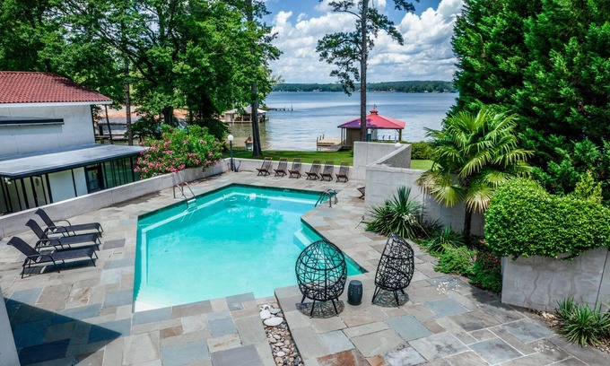 Milledgeville House | Stunning Mediterranean Style Lakefront, Sleeps 8! Private Dock, Pool, + Kayaks!