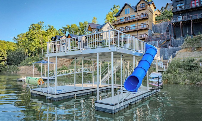 Sevierville Cabin | Stunning Mtn Cabin on Lake w/2 Stry Dock, Indoor Pool, Hot Tub, and Arcade Room