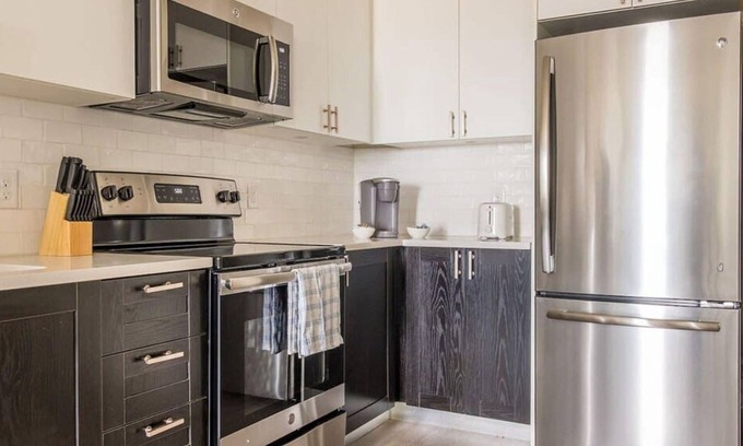 Downtown Louisville Apartment | Stunning Nulu 1BR Cozysuites 02