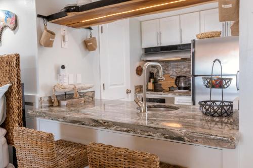 New Smyrna Beach Apartment | Stunning Ocean Views STEPS from the Beach with Pool! Fabulous 4th Floor Studio!