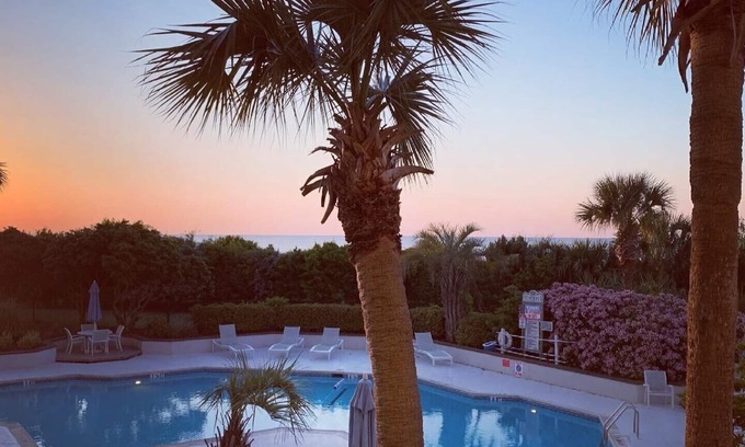 Wrightsville Beach Condo | Stunning pool and ocean views await you in this beautiful, convenient condo.